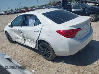 2017 Toyota Corolla L z VIN 2T1BURHE1HC814645, wystawiony jako IAAI lot #42113167 z przebiegiem 111 317 mil mil oraz . Historia ofert i sprzedaży dostępna na DreamBid. Obrazek 3.