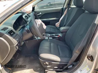 2012 Ford Fusion SE z VIN 3FAHP0HG8CR145183, wystawiony jako Copart lot #58627705 z przebiegiem 236 148 mil mil oraz Szkoda całkowita • Salvage title. Historia ofert i sprzedaży dostępna na DreamBid. Obrazek 7.