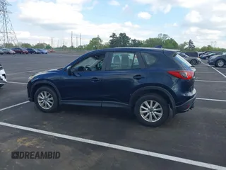 2016 Mazda CX-5 Sport with VIN JM3KE2BY3G0740488, listed as a IAAI auction lot 42000449 with 43,009 mi miles. Bid and sale history available at carsss.com. Image 14.