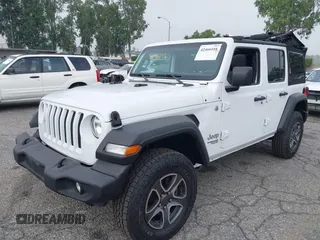 2021 Jeep Wrangler Unlimited Sport Altitude with VIN 1C4HJXDN5MW644613, listed as a IAAI auction lot 42466188 with 63,959 mi miles and . Bid and sale history available at DreamBid. Image 17.