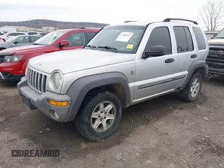 2004 Jeep Liberty Sport with VIN 1J4GL48K74W318861, listed as a IAAI auction lot 41706222 with 211,089 mi miles. Bid and sale history available at carsss.com. Image 21.