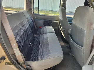 1991 Ford Explorer Eddie Bauer z VIN 1FMDU34XXMUC65601, wystawiony jako Copart lot #76207454 z przebiegiem 99 787 mil mil oraz Czysty tytuł • Clean title. Historia ofert i sprzedaży dostępna na DreamBid. Obrazek 6.