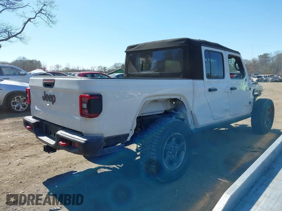 2020 Jeep Gladiator Rubicon with VIN 1C6JJTBG1LL181875, listed as a IAAI auction lot 41722037 with 51,037 mi miles and . Bid and sale history available at DreamBid. Image 14.