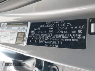 2023 Kia Forte LXS z VIN 3KPF24AD1PE621214, wystawiony jako IAAI lot #41970298 z przebiegiem 35 996 mil mil oraz . Historia ofert i sprzedaży dostępna na DreamBid. Obrazek 9.
