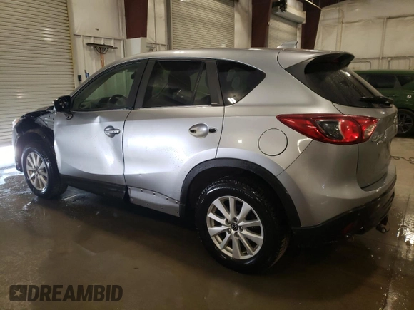 2015 Mazda CX-5 Touring with VIN JM3KE4CY7F0516102, listed as a Copart auction lot 48710205 with 163,734 mi miles and Non Repairable. Bid and sale history available at carsss.com. Image 2.
