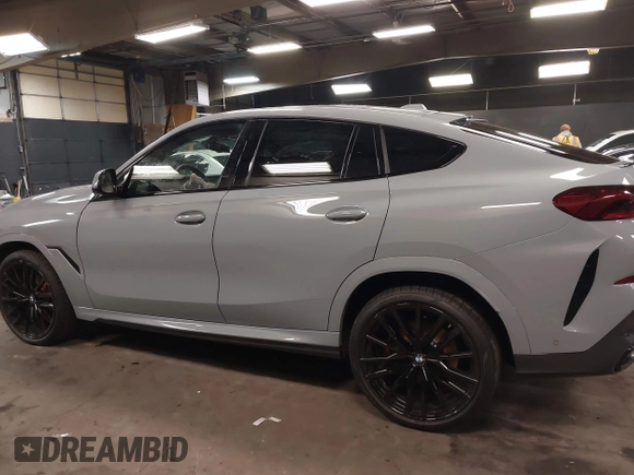 2025 BMW X6 xDrive40i with VIN 5UX33EX04S9Z44291, listed as a IAAI auction lot 41827897 with 1,053 mi miles. Bid and sale history available at carsss.com. Image 14.