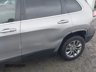 2019 Jeep Cherokee Latitude Plus with VIN 1C4PJMLX7KD104542, listed as a IAAI auction lot 41972055 with 105,129 mi miles. Bid and sale history available at carsss.com. Image 18.