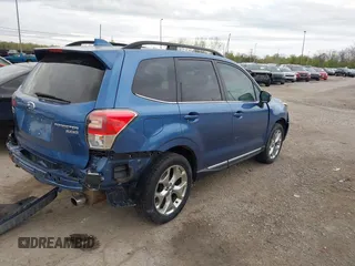 2017 Subaru Forester Touring with VIN JF2SJAWC4HH803275, listed as a IAAI auction lot 42109087 with 114,532 mi miles and . Bid and sale history available at DreamBid. Image 4.