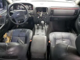 2003 Jeep Grand Cherokee Limited with VIN 1J8GW58N43C546645, listed as a Copart auction lot 77046984 with 186,039 mi miles and Clean Title. Bid and sale history available at carsss.com. Image 8.
