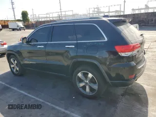 2014 Jeep Grand Cherokee Limited with VIN 1C4RJEBG3EC580734, listed as a Copart auction lot 54830525 with 154,233 mi miles and Salvage Title. Bid and sale history available at DreamBid. Image 2.