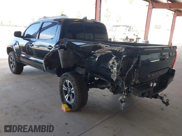 2016 Toyota Tacoma SR with VIN 5TFCZ5AN8GX020900, listed as a IAAI auction lot 41911329 with 133,931 mi miles. Bid and sale history available at carsss.com. Image 3.