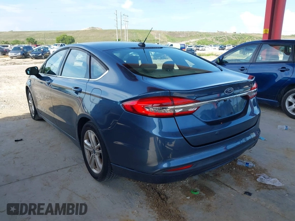 2018 Ford Fusion SE z VIN 3FA6P0HD8JR201052, wystawiony jako IAAI lot #42367050 z przebiegiem 90 502 mil mil oraz . Historia ofert i sprzedaży dostępna na DreamBid. Obrazek 3.