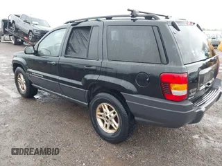 2004 Jeep Grand Cherokee Laredo with VIN 1J4GW48S74C390569, listed as a IAAI auction lot 42384503 with 191,530 mi miles and . Bid and sale history available at DreamBid. Image 3.