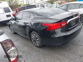 2016 Nissan Maxima SV z VIN 1N4AA6AP6GC400496, wystawiony jako IAAI lot #41908190 z przebiegiem 149 984 mil mil oraz . Historia ofert i sprzedaży dostępna na DreamBid. Obrazek 3.