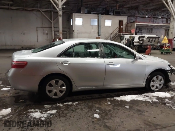 2009 Toyota Camry z VIN 4T1BE46KX9U352465, wystawiony jako IAAI lot #41518299 z przebiegiem 107 348 mil mil oraz . Historia ofert i sprzedaży dostępna na DreamBid. Obrazek 13.