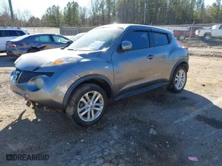 2013 Nissan Juke S with VIN JN8AF5MRXDT205293, listed as a IAAI auction lot 41381474 with 201,343 mi miles. Bid and sale history available at carsss.com. Image 2.