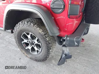 2021 Jeep Wrangler Unlimited Rubicon z VIN 1C4HJXFG8MW785318, wystawiony jako IAAI lot #42118969 z przebiegiem 61 572 mil mil oraz . Historia ofert i sprzedaży dostępna na DreamBid. Obrazek 17.