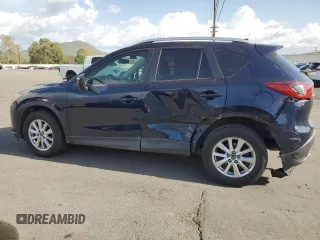 2016 Mazda CX-5 Sport with VIN JM3KE2BY0G0730906, listed as a Copart auction lot 51611865 with 207,166 mi miles and Salvage Title. Bid and sale history available at carsss.com. Image 2.