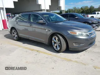 2011 Ford Taurus SHO z VIN 1FAHP2KT6BG167447, wystawiony jako IAAI lot #41433934 z przebiegiem 201 600 mil mil oraz . Historia ofert i sprzedaży dostępna na DreamBid. Obrazek 1.
