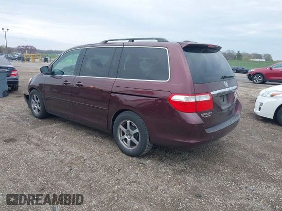 2007 Honda Odyssey Touring with VIN 5FNRL38847B048235, listed as a IAAI auction lot 41963652 with 176,412 mi miles. Bid and sale history available at carsss.com. Image 3.