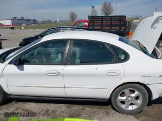 2000 Ford Taurus SE with VIN 1FAFP5327YA186258, listed as a IAAI auction lot 41795342 with 123,174 mi miles. Bid and sale history available at carsss.com. Image 15.