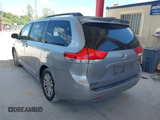 2011 Toyota Sienna XLE AAS with VIN 5TDYK3DC1BS007820, listed as a IAAI auction lot 41935200 with 123,554 mi miles. Bid and sale history available at carsss.com. Image 3.