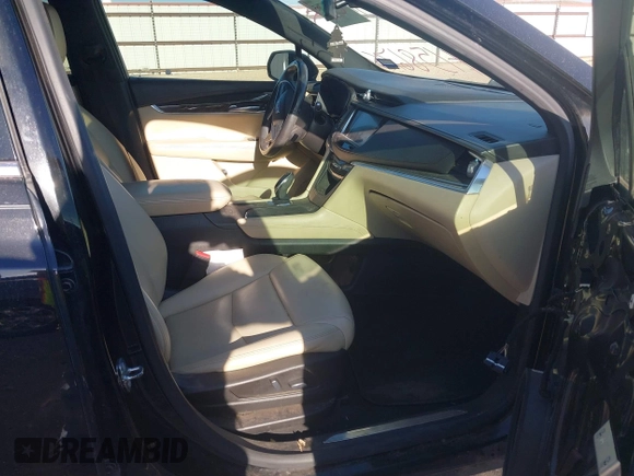 2018 Cadillac XT5 FWD with VIN 1GYKNARS3JZ104087, listed as a IAAI auction lot 41586765 with 137,369 mi miles. Bid and sale history available at carsss.com. Image 5.