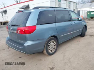 2008 Toyota Sienna XLE with VIN 5TDZK22C18S102498, listed as a IAAI auction lot 41623508 with 214,485 mi miles. Bid and sale history available at carsss.com. Image 4.