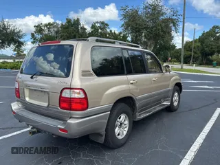 1998 Lexus LX 470 z VIN JT6HT00W7W0008417, wystawiony jako Copart lot #79324334 z przebiegiem 183 911 mil mil oraz Czysty tytuł • Clean title. Historia ofert i sprzedaży dostępna na DreamBid. Obrazek 4.