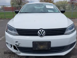 2014 Volkswagen Jetta Sedan S with VIN 3VW2K7AJ5EM329328, listed as a IAAI auction lot 41995084 with 72,409 mi miles. Bid and sale history available at carsss.com. Image 6.