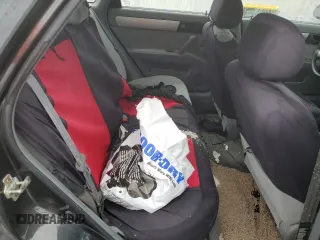 2004 Suzuki Forenza z VIN KL5JJ52Z44K953823, wystawiony jako Copart lot #86589504 z przebiegiem 150 699 mil mil oraz Tytuł czysty. Historia ofert i sprzedaży dostępna na DreamBid. Obrazek 10.