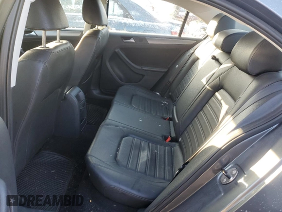 2014 Volkswagen Jetta SEL z VIN 3VWL17AJ6EM438176, wystawiony jako Copart lot #85081294 z przebiegiem 108 420 mil mil oraz Szkoda całkowita • Salvage title. Historia ofert i sprzedaży dostępna na DreamBid. Obrazek 10.