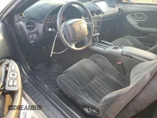 2001 Pontiac Firebird Firebird z VIN 2G2FS22K412113906, wystawiony jako Copart lot #72460364 z przebiegiem 189 679 mil mil oraz Czysty tytuł • Clean title. Historia ofert i sprzedaży dostępna na DreamBid. Obrazek 8.