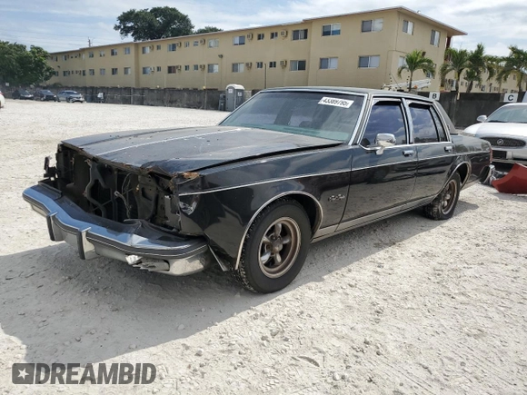 1985 Oldsmobile 88 z VIN 1G3BV69Y1FY384631, wystawiony jako Copart lot #43389795 z przebiegiem 180 641 mil mil oraz Szkoda całkowita • Salvage title. Historia ofert i sprzedaży dostępna na DreamBid. Obrazek 1.