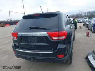 2012 Jeep Grand Cherokee Overland with VIN 1C4RJFCG3CC148601, listed as a IAAI auction lot 41717658 with 127,681 mi miles. Bid and sale history available at carsss.com. Image 17.