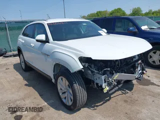 2022 Volkswagen Atlas SE z VIN 1V2HE2CA5NC225233, wystawiony jako IAAI lot #42366811 z przebiegiem 27 986 mil mil oraz . Historia ofert i sprzedaży dostępna na DreamBid. Obrazek 1.