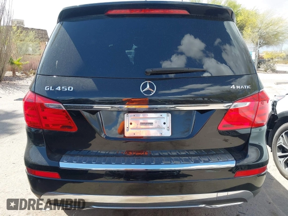 2014 Mercedes-Benz GL 450 z VIN 4JGDF7CE1EA342408, wystawiony jako IAAI lot #41968441 z przebiegiem 120 459 mil mil oraz . Historia ofert i sprzedaży dostępna na DreamBid. Obrazek 16.
