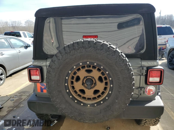 2023 Jeep Wrangler Sport S with VIN 1C4HJXDG8PW675134, listed as a Copart auction lot 85949314 with 19,128 mi miles and Salvage Title. Bid and sale history available at DreamBid. Image 6.