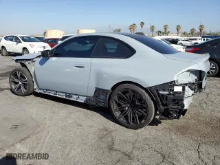 2023 BMW M2 with VIN 3MF13DM09P8C99482, listed as a Copart auction lot 52844604 with 8,974 mi miles. Bid and sale history available at carsss.com. Image 2.