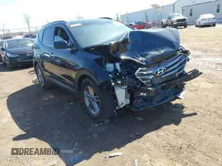 2017 Hyundai Santa Fe 2.4L z VIN 5NMZU3LB6HH031260, wystawiony jako IAAI lot #41829296 z przebiegiem Nie podano mil oraz . Historia ofert i sprzedaży dostępna na DreamBid. Obrazek 1.