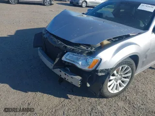 2013 Chrysler 300 Motown with VIN 2C3CCAAG0DH633741, listed as a IAAI auction lot 41702698 with NaN miles. Bid and sale history available at carsss.com. Image 6.