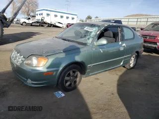 2003 Hyundai Accent GL with VIN KMHCG35CX3U242848, listed as a Copart auction lot 86558394 with 56,248 mi miles and Salvage Title. Bid and sale history available at carsss.com. Image 1.