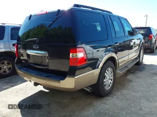 2013 Ford Expedition XLT with VIN 1FMJU1H52DEF31591, listed as a IAAI auction lot 42243398 with 195,385 mi miles and . Bid and sale history available at DreamBid. Image 4.