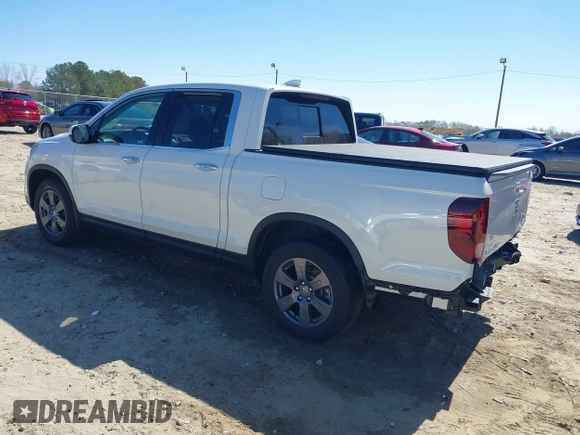 2020 Honda Ridgeline RTL-E with VIN 5FPYK3F75LB000317, listed as a IAAI auction lot 41850029 with 17,430 mi miles and . Bid and sale history available at DreamBid. Image 3.