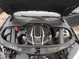 2015 Audi A8 4.0T with VIN WAUJ2AFD3FN024977, listed as a Copart auction lot 39952623 with 102,365 mi miles and . Bid and sale history available at DreamBid. Image 11.