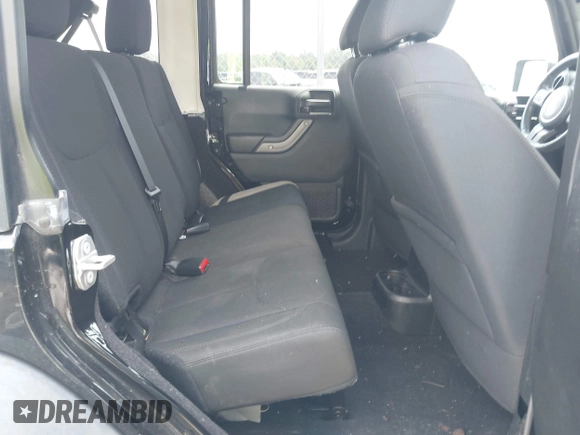 2017 Jeep Wrangler Unlimited Sport with VIN 1C4BJWDG6HL699547, listed as a IAAI auction lot 42652658 with 89,286 mi miles and . Bid and sale history available at DreamBid. Image 8.