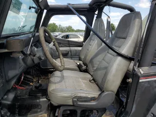 1995 Jeep Wrangler S with VIN 1J4FY19P4SP288991, listed as a Copart auction lot 48858575 with 138,821 mi miles and Salvage Title. Bid and sale history available at carsss.com. Image 7.