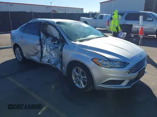 2018 Ford Fusion SE with VIN 3FA6P0HD1JR227721, listed as a IAAI auction lot 41587967 with 180,084 mi miles. Bid and sale history available at carsss.com. Image 1.