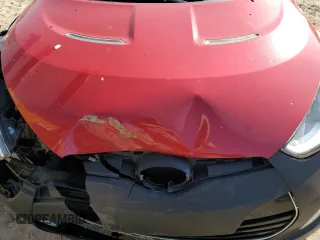 2014 Hyundai Veloster z VIN KMHTC6AD3EU217143, wystawiony jako Copart lot #43716395 z przebiegiem 137 865 mil mil oraz Szkoda całkowita • Salvage title. Historia ofert i sprzedaży dostępna na DreamBid. Obrazek 12.