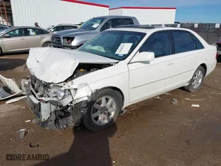 2000 Toyota Avalon XL with VIN 4T1BF28B3YU050271, listed as a IAAI auction lot 41668355 with 90,879 mi miles. Bid and sale history available at carsss.com. Image 2.